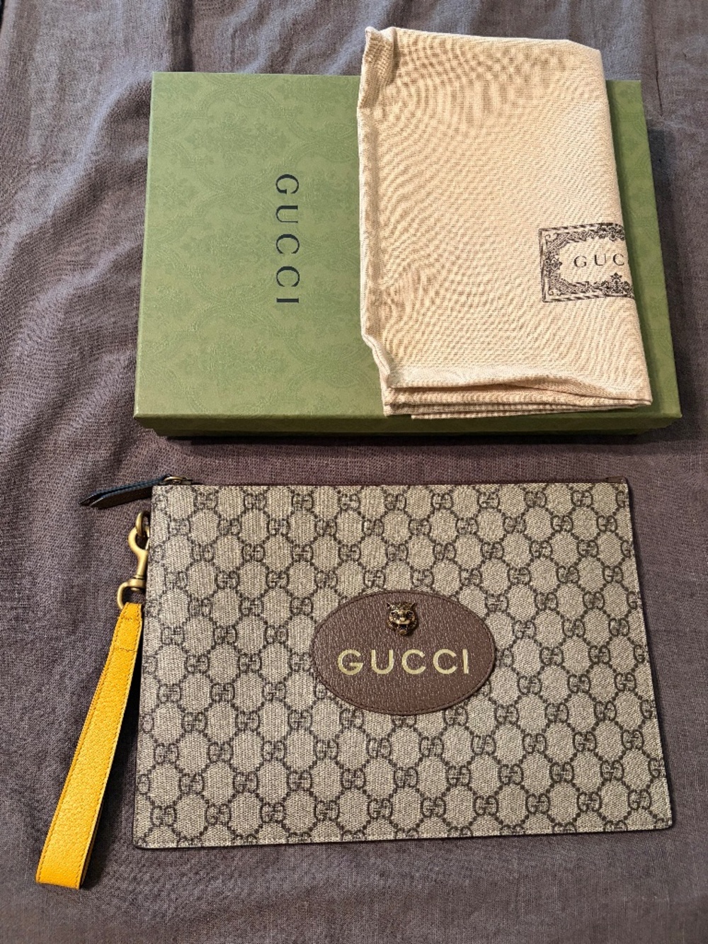 Gucci Monogram Wristlet